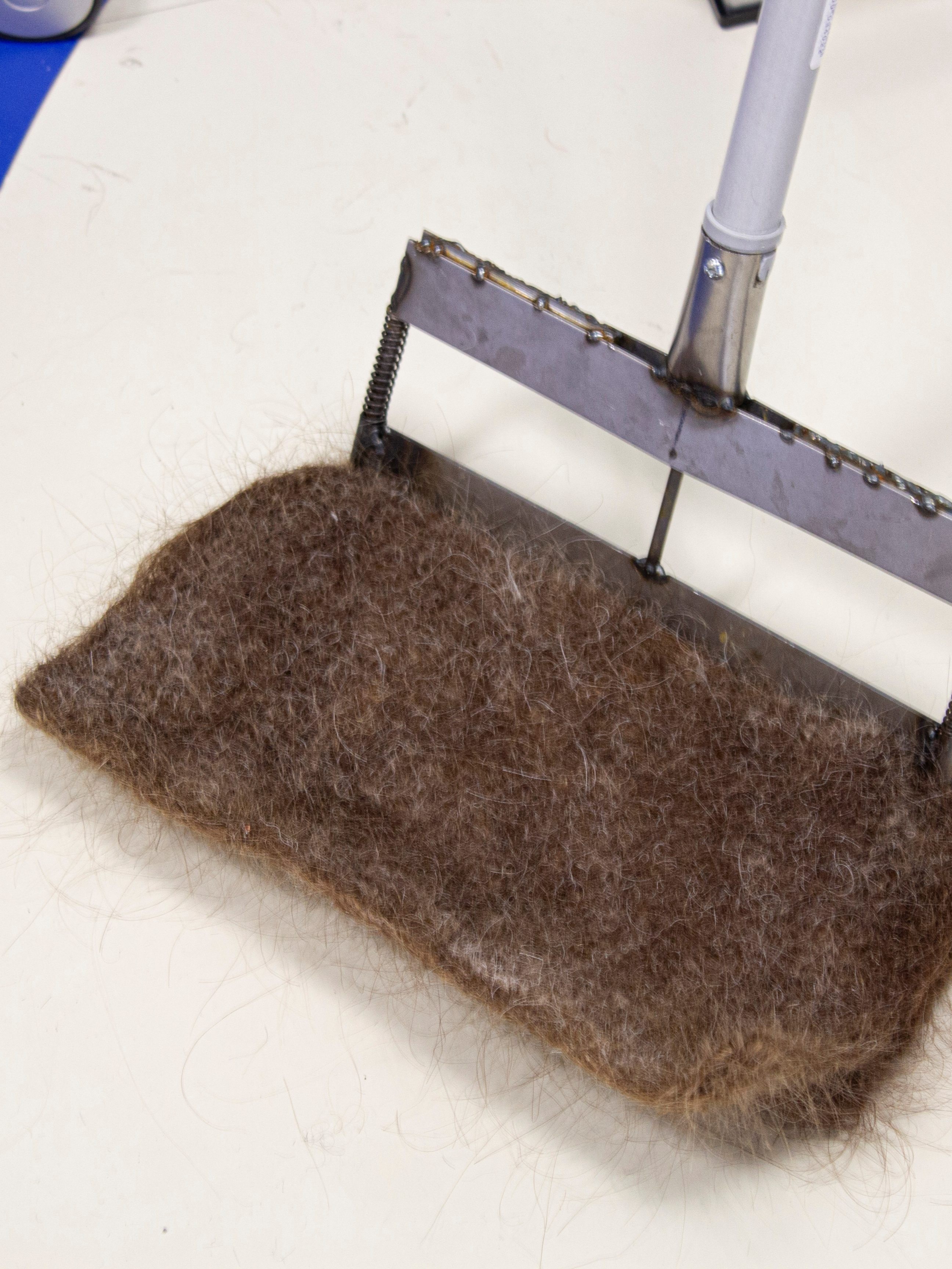 absorbent mats made from hair fibres