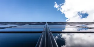  The sky is reflected from the glass wall