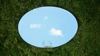  A round mirror on the grass