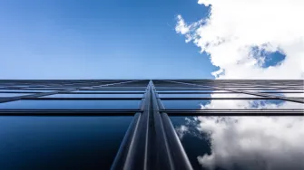  The sky is reflected from the glass wall