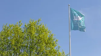 Lahti on Euroopan ympäristöpääkaupunki 2021 -lippu liehuu.