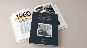 historiikki painettuna kirjana pöydällä