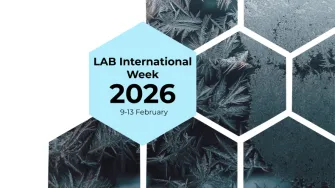 A picture where it reads LAB International Week and snowy background. 