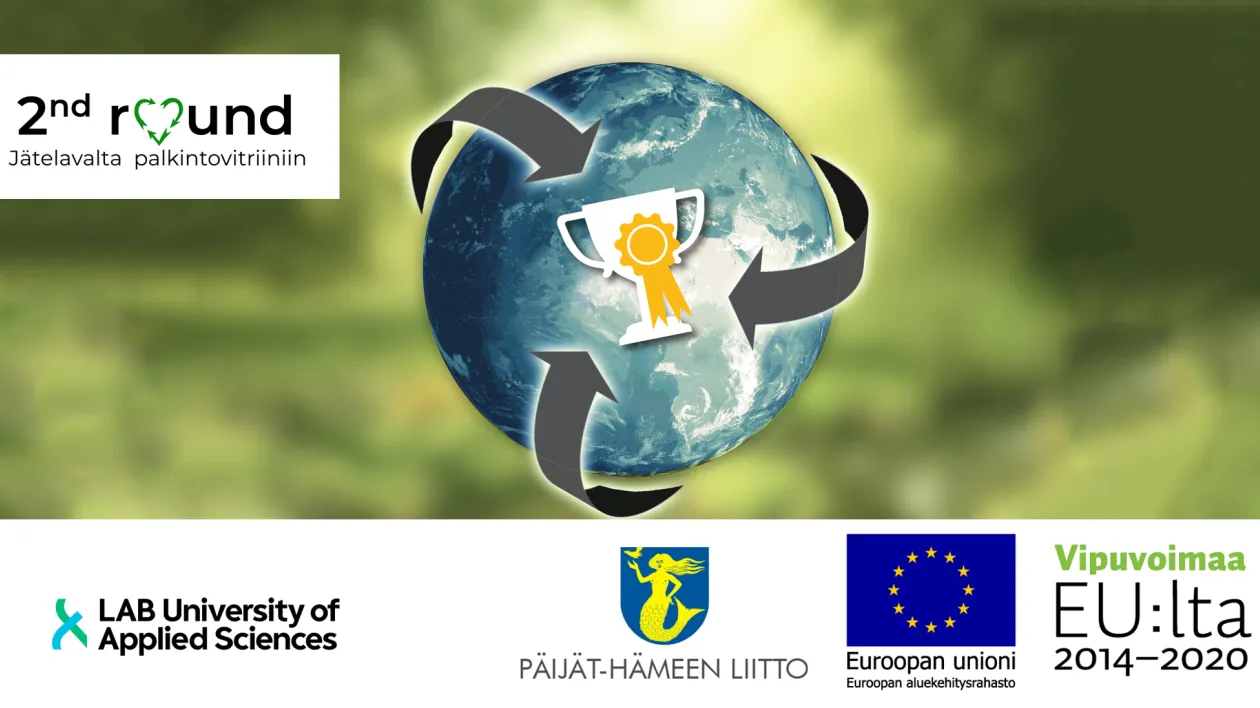 Kuvassa maapallo vihreällä pohjalla ja kiertotalouden hengessä toteutettu palkintopokaali