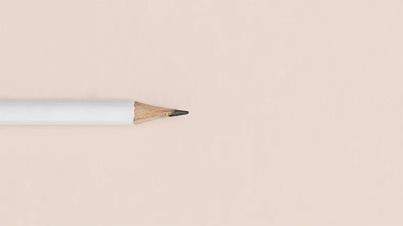 Pencil on light beige background 