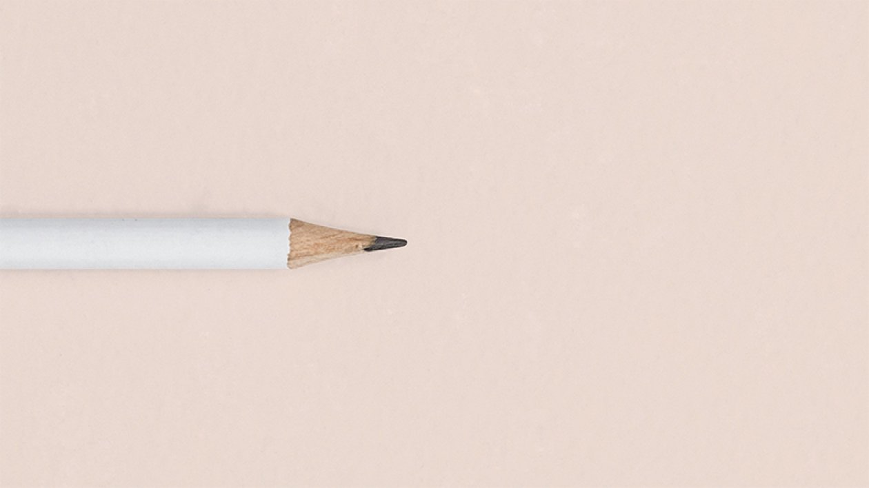 Pencil on light beige background 