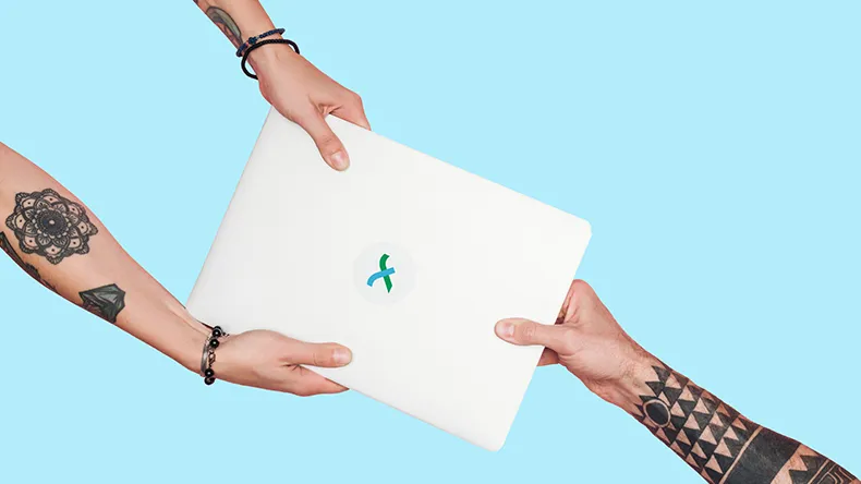 Tattooed people pulling laptop on a light blue background.