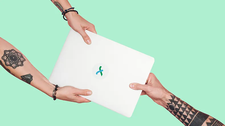 Tattooed people pulling laptop on a light green background.