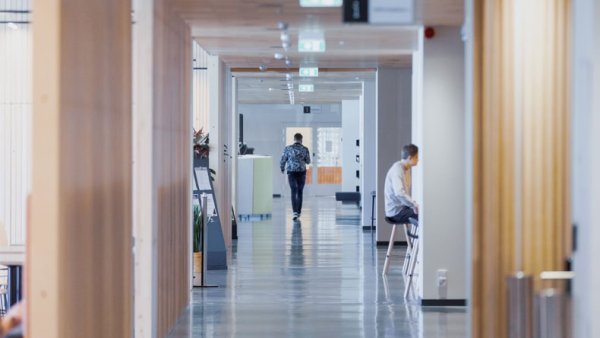 A person walking in the hall