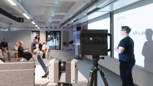 Students in a classroom with technology equipment