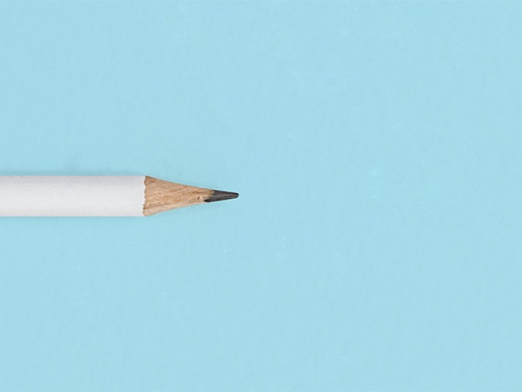 Pencil on a light blue background